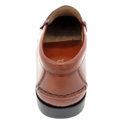 Inside view of brown leather loafers with slim, elegant fit