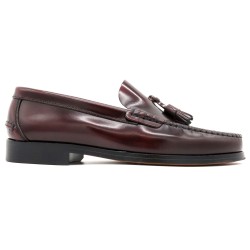 Side profile of elegant burgundy leather loafers with stitched leather sole