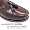 Close-up of premium burgundy full-grain leather and tassel detail