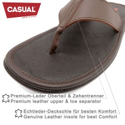 close up genuine leather texture dark brown sandals